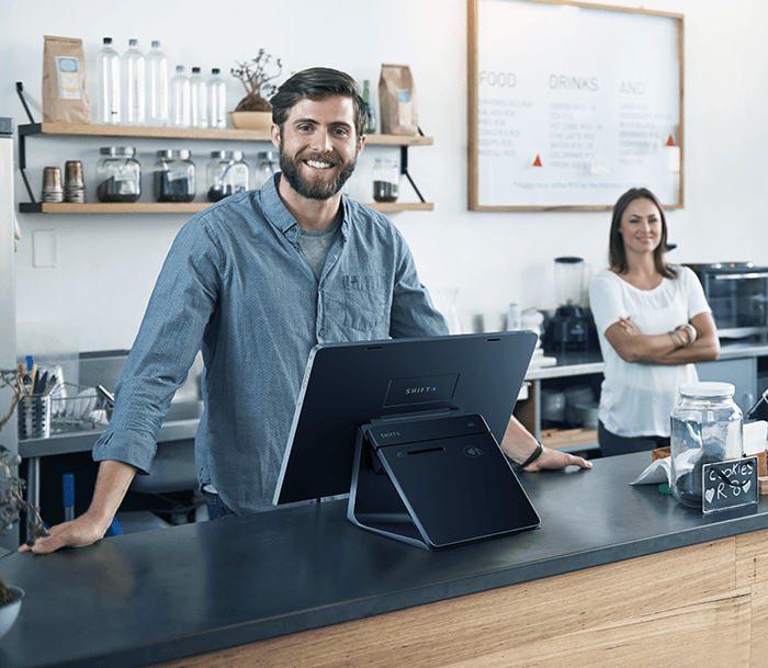 Restaurant owner with a new Shift4 Dine system